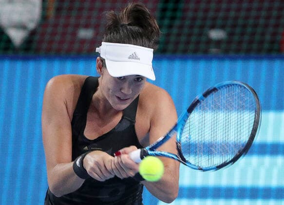 MOSCOW, RUSSIA - OCTOBER 20, 2021: Spain s Garbine Muguruza returns the ball in her women s singles Round of 16 tennis match against the Czech Republic s Tereza Martincova at the VTB Kremlin Cup 2021 at the Luzhniki Sports Palace. Mikhail Tereshchenko TASS  TS114D6A