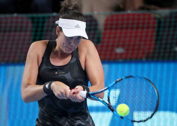 MOSCOW, RUSSIA - OCTOBER 20, 2021: Spain s Garbine Muguruza returns the ball in her women s singles Round of 16 tennis match against the Czech Republic s Tereza Martincova at the VTB Kremlin Cup 2021 at the Luzhniki Sports Palace. Mikhail Tereshchenko TASS  TS114D6B