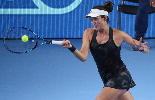 MOSCOW, RUSSIA - OCTOBER 20, 2021: Spain s Garbine Muguruza returns the ball in her women s singles Round of 16 tennis match against the Czech Republic s Tereza Martincova at the VTB Kremlin Cup 2021 at the Luzhniki Sports Palace. Mikhail Tereshchenko TASS  TS114D79
