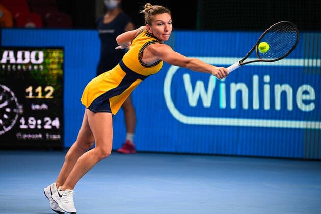 6677722 21.10.2021 Romania s Simona Halep returns a shot during the women s singles second round tennis match against Russia s Veronika Kudermetova at the Kremlin Cup, in Moscow, Russia. Vladimir Astapkovich Sputnik Russia Tennis Kremlin Cup  d48e23a435103a3f