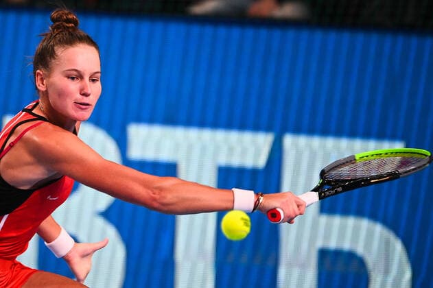 6677718 21.10.2021 Russia s Veronika Kudermetova returns a shot during the women s singles second round tennis match against Romania s Simona Halep at the Kremlin Cup, in Moscow, Russia. Vladimir Astapkovich Sputnik Russia Tennis Kremlin Cup  d12e4b18fd9dc04