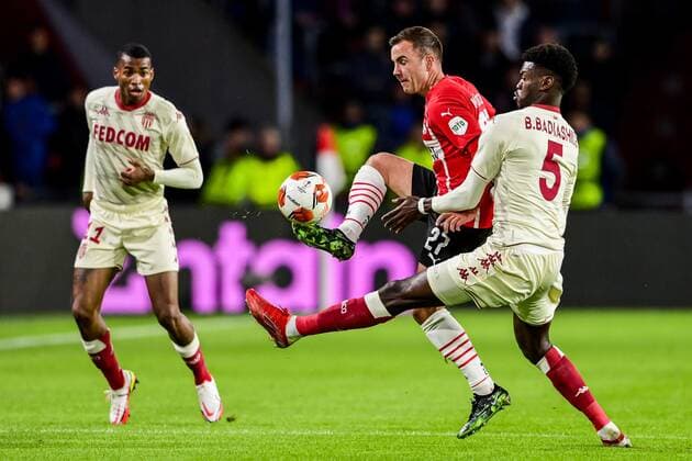 EINDHOVEN lr Mario Gotze of PSV Eindhoven, Benoit Badiashile of AS Monaco during the UEFA Europa League match between PSV Eindhoven and AS Monaco at Phillips Stadium on October 21, 2021 in Eindhoven, Netherlands ANP OLAF KRAAK UEFA Europa League 2021 2022 xVIxANPxSportx xxANPxIVx 439502813