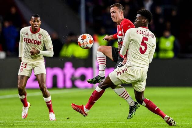 EINDHOVEN lr Mario Gotze of PSV Eindhoven, Benoit Badiashile of AS Monaco during the UEFA Europa League match between PSV Eindhoven and AS Monaco at Phillips Stadium on October 21, 2021 in Eindhoven, Netherlands ANP OLAF KRAAK UEFA Europa League 2021 2022 xVIxANPxSportx xxANPxIVx 439502832