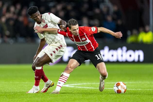 EINDHOVEN, Netherlands, 21-10-2021, football, Philips stadium, Europa League, season 2021 2022, during the match PSV - Monaco, AS Monaco player Aurelien Tchouameni, PSV player Olivier Boscagli PSV - Monaco  x13998073x Copyright: