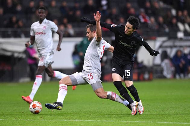 Football Europa League matchday 3 Eintracht Frankfurt Olympiakos Piraeus on 21 10 2021 at Deutsche Bank Park in Frankfurt Sokratis Papastathopoulos Piraeus , left Daichi Kamada Frankfurt , right xHDx