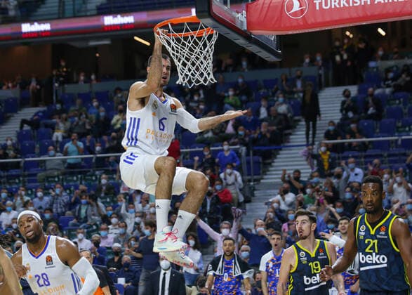 15th October 2021; Wizink Center; Madrid, Spain; Turkish Airlines Euroleague Basketball , Real Madrid versus Fenerbahce Beko Istanbul; Alberto Abalde (Real Madrid Baloncesto) hangs from the net after a dunk  ActionPlus12332406 AgenciaLOF