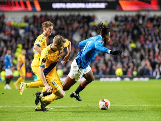 Mandatory Credit: Photo by Stuart Wallace Shutterstock (12547363av) Sigurd Rosted of Brondby appears to foul Joe Aribo of Rangers as he challenges him inside the Brondby penalty area. Referee Fran Jovic allowed play to continue and there was no VAR check. Rangers v Brondby, UEFA Europa League, Group A, Football, Ibrox Stadium, Glasgow, UK - 21 Oct 2021 EDITORIAL USE ONLY No use with unauthorised audio, video, data, fixture lists, club league logos or live services. Online in-match use limited to 120 images, no video emulation. No use in betting, games or single club league player publications. Rangers v Brondby, UEFA Europa League, Group A, Football, Ibrox Stadium, Glasgow, UK - 21 Oct 2021 EDITORIAL USE ONLY No use with unauthorised audio, video, data, fixture lists, club league logos or live services. Online in-match use limited to 120 images, no video emulation. No use in betting, games or single club league player publications. Copyright: xStuartxWallace Shutterstockx 12547363av