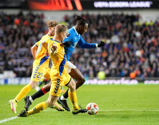 Mandatory Credit: Photo by Stuart Wallace Shutterstock (12547363as) Sigurd Rosted of Brondby appears to foul Joe Aribo of Rangers as he challenges him inside the Brondby penalty area. Referee Fran Jovic allowed play to continue and there was no VAR check. Rangers v Brondby, UEFA Europa League, Group A, Football, Ibrox Stadium, Glasgow, UK - 21 Oct 2021 EDITORIAL USE ONLY No use with unauthorised audio, video, data, fixture lists, club league logos or live services. Online in-match use limited to 120 images, no video emulation. No use in betting, games or single club league player publications. Rangers v Brondby, UEFA Europa League, Group A, Football, Ibrox Stadium, Glasgow, UK - 21 Oct 2021 EDITORIAL USE ONLY No use with unauthorised audio, video, data, fixture lists, club league logos or live services. Online in-match use limited to 120 images, no video emulation. No use in betting, games or single club league player publications.  Copyright: xStuartxWallace Shutterstockx 12547363as