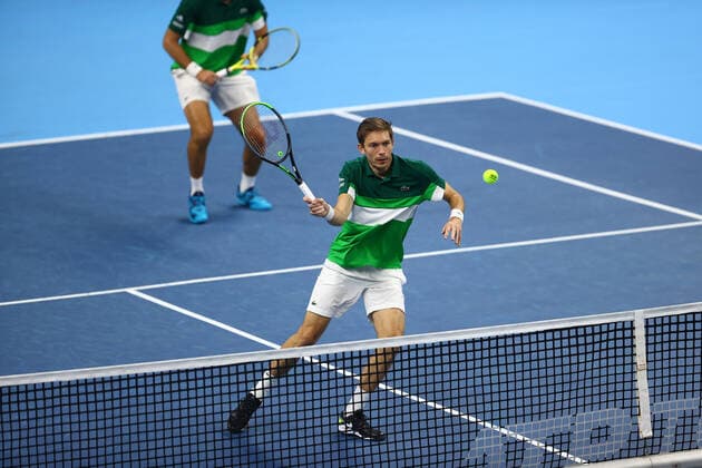 French Nicolas Mahut and French fabrice martin pictured during a doubles men game between Ukrainian Molchanov and Kazach Nedovyesov and French pair Mahut and Martin, a semi finals game at the European Open Tennis ATP, Tennis Herren tournament, in Antwerp, Friday 22 October 2021. DAVIDxPINTENS  x3120573x