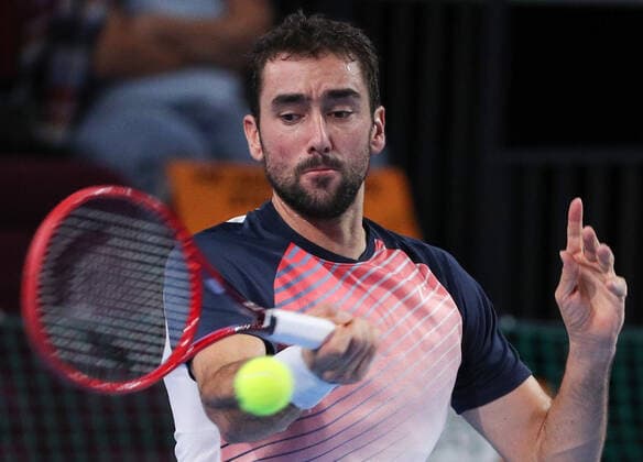 MOSCOW, RUSSIA - OCTOBER 22, 2021: Croatiaâ€™s Marin Cilic in action in his menâ€™s singles quarterfinal tennis match against Spain s Pedro Martinez at the VTB Kremlin Cup 2021 at Irina Viner-Usmanova Rhythmic gymnastics, Rhythmische Sportgymnastik, RSG Center. Mikhail Tereshchenko TASS  TS1153D1