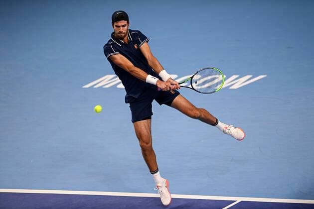 6678587 22.10.2021 Russia s Karen Khachanov returns a shot during the men s singles quarterfinal tennis match against Australia s John Millman at the Kremlin Cup, in Moscow, Russia. Alexey Filippov Sputnik Russia Tennis Kremlin Cup  e057454bc02be5e5