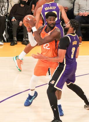 October 22, 2021, Los Angeles, California, USA: Lakers Anthony Davis plays tough defense on Suns Deandre Ayton during the contest as the host Los Angeles Lakers fall to the visiting Phoenix Suns 105-115 on Friday, October 22, 2021 at The Staples Center in Los Angeles, California. PI Los Angeles USA - ZUMAp124 20211022_zaa_p124_004 Copyright: xBURTxHARRISx