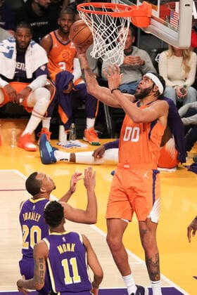 October 22, 2021, Los Angeles, California, USA: Suns JaVale McGee goes in for this shot at the rim over Laker defenders Avery Bradley and Malik Monk during the contest as the host Los Angeles Lakers fall to the visiting Phoenix Suns 105-115 on Friday, October 22, 2021 at The Staples Center in Los Angeles, California. PI Los Angeles USA - ZUMAp124 20211022_zaa_p124_011 Copyright: xBURTxHARRISx