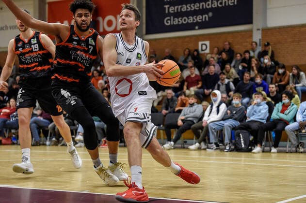 Barmer 2 Basketball Bundesliga ProB, Rheinstars Koeln vs Dragons Rhoendorf, 23 10 2021 Mark Mboya Kotieno Dragons Rhoendorf 7 , Thomas Michel RheinStars Koeln 7 , Barmer 2 Basketball Bundesliga ProB, Rheinstars Koeln vs Dragons Rhoendorf on 23 10 2021 at ASV Koeln in Koeln Nordrhein Westfalen Copyright: xBEAUTIFULxSPORTS Mueller-Laschetx