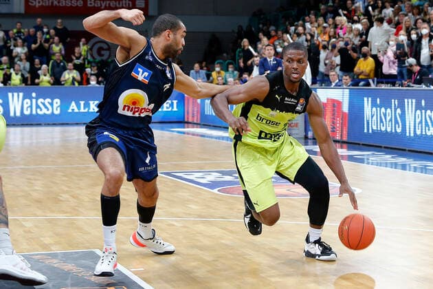 5 Matchday of the easyCredit BBL Basketball Bundesliga at Oberfrankenhalle in Bayreuth Season 2021 2022 Medi Bayreuth vs HAKRO Merlins Crailsheim Cameron Wells Medi Bayreuth 22 right Elias Lasisi HAKRO Merlins Crailsheim 6 left
