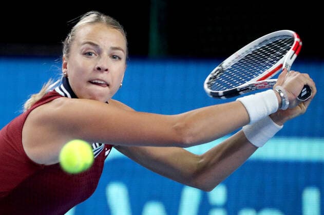 MOSCOW, RUSSIA - OCTOBER 24, 2021: Estonia s Anett Kontaveit returns the ball in her women s singles final match against Russia s Ekaterina Alexandrova at the VTB Kremlin Cup 2021 international tennis tournament at the Irina Viner-Usmanova Gymnastics Palace. Mikhail Tereshchenko TASS  TS115783