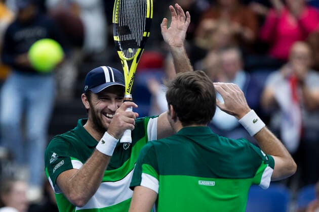 French Fabrice Martin and French Nicolas Mahut celebrate after winning a doubles men game between Dutch pair Koolhof - Rojer and French Mahut - Martin, the finals of the European Open Tennis ATP, Tennis Herren tournament, in Antwerp, Sunday 24 October 2021. KRISTOFxVANxACCOM  x3122824x
