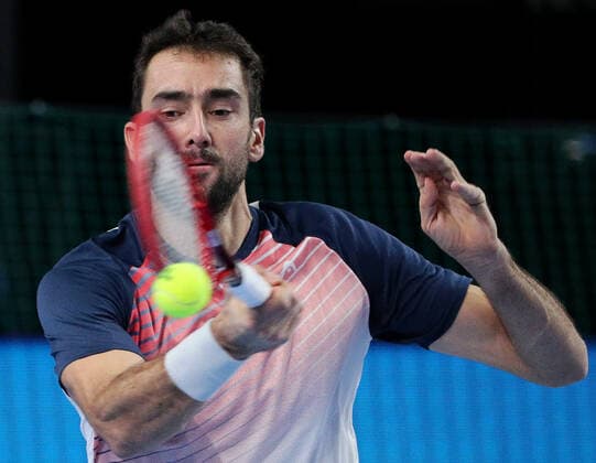 MOSCOW, RUSSIA - OCTOBER 24, 2021: Croatia s Marin Cilic returns the ball in his singles final match against Russia s Aslan Karatsev at the VTB Kremlin Cup 2021 international tennis tournament at the Irina Viner-Usmanova Gymnastics Palace. Mikhail Tereshchenko TASS  TS115881