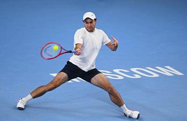 6679587 24.10.2021 Russia s Aslan Karatsev returns a shot during the men s singles final tennis match against Croatia s Marin Cilic at the Kremlin Cup, in Moscow, Russia. Alexey Filippov Sputnik Russia Tennis Kremlin Cup  fd8b50ea03167773