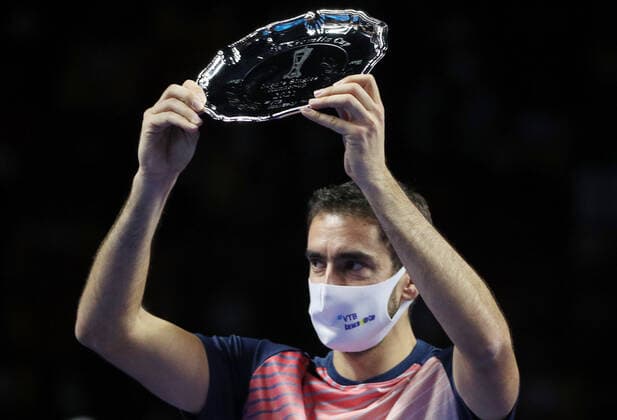 MOSCOW, RUSSIA - OCTOBER 24, 2021: Croatia s Marin Cilic poses with his trophy as the runner-up of the VTB Kremlin Cup 2021 international tennis tournament during the victory ceremony at the Irina Viner-Usmanova Gymnastics Palace. Mikhail Tereshchenko TASS  TS115898
