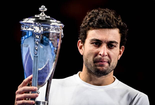6679657 24.10.2021 Russia s Aslan Karatsev poses with a trophy after winning the men s singles final tennis match against Croatia s Marin Cilic at the Kremlin Cup, in Moscow, Russia. Alexey Filippov Sputnik Russia Tennis Kremlin Cup  c7c5dab0b6405b57