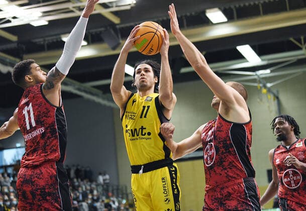 Basketball 2 Bundesliga 2021 2022 6 Matchday 24 09 2021 in Rottenburg Tigers Tuebingen Bayer Giants Leverkusen Erol Ersek center, Tigers vs Ferenc Gille right, Leverkusen and Dennis Heinzmann right, Leverkusen.