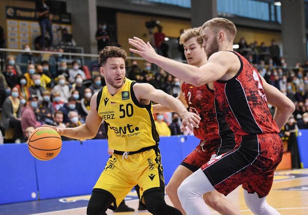 Basketball 2 Bundesliga 2021 2022 6 Matchday 24 09 2021 in Rottenburg Tigers Tuebingen Bayer Giants Leverkusen Joanic Gruettner Bacoul left, Tigers vs Marko Bacak right, Leverkusen and Robert Merz center, Leverkusen.