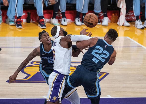 October 24, 2021, Los Angeles, California, USA: LeBron James 6 of the Los Angeles Lakers is blocked by Desmond Bane 22 and Ja Morant 12 of the Memphis Grizzlies during their regular season NBA, Basketball Herren, USA game on Sunday October 24, 2021 at the Staples Center in Los Angeles, California. Lakers defeat Grizzlies, 121-118. PI Los Angeles USA - ZUMAp124 20211024_zaa_p124_009 Copyright: xJAVIERxROJASx