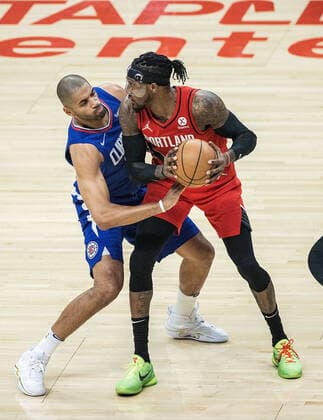 October 25, 2021, Los Angeles, California, USA: Nicolas Batum 33 of the Los Angeles Clippers defends against Robert Covington 33 of the Portland Trail Blazers during their NBA, Basketball Herren, USA game on Monday October 25, 2021 at the Staples Center in Los Angeles, California. Clippers defeats Trail Blazers, 116-86. PI Los Angeles USA - ZUMAp124 20211025_zaa_p124_001 Copyright: xJAVIERxROJASx