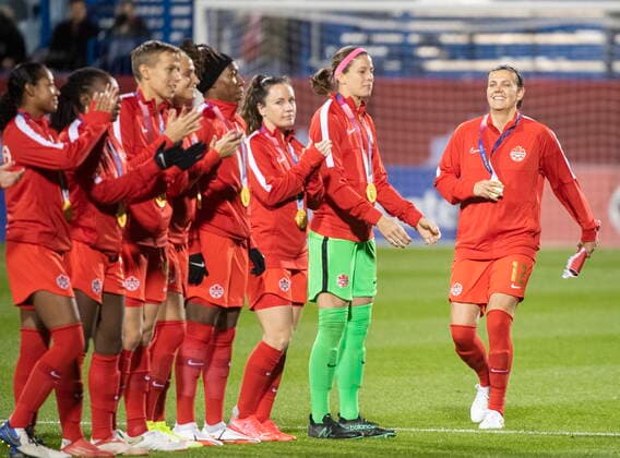 October 26, 2021, Montreal, PQ, Canada: CanadaÃ¢â‚¬â ¢s Christine Sinclair, right, walks onto the pitch prior to their Celebration Tour soccer game against New Zealand in Montreal, Tuesday, October 26, 2021. Christine Sinclair,  - ZUMAc35_ 20211026_zaf_c35_344 Copyright: xGrahamxHughesx