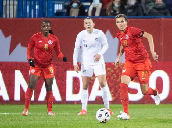 October 26, 2021, Montreal, PQ, Canada: CanadaÃ¢â‚¬â ¢s Christine Sinclair (12) plays a pass during first half Celebration Tour soccer action against New Zealand in Montreal, Tuesday, October 26, 2021. Christine Sinclair,  - ZUMAc35_ 20211026_zaf_c35_353 Copyright: xGrahamxHughesx