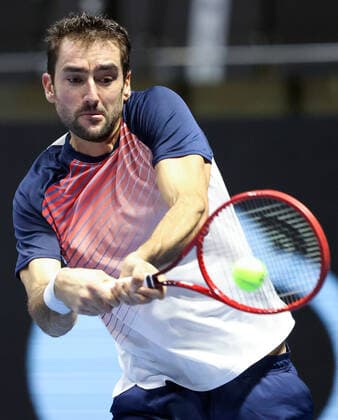 ST PETERSBURG, RUSSIA - OCTOBER 27, 2021: Croatia s Marin Cilic returns the ball in his singles Round of 32 tennis match against Spain s Albert Ramos-Vinolas at the St Petersburg Open 2021 international tournament held at Sibur Arena as part of the ATP, Tennis Herren World Tour 250 series. Peter Kovalev TASS  TS115E61