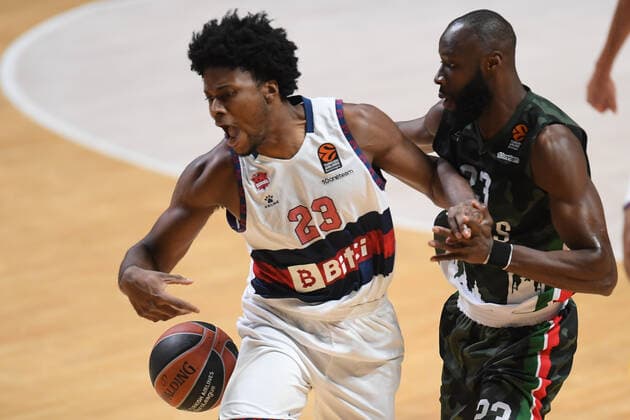 6682851 27.10.2021 UNICS Tonye Jekiri, right, and Baskonia?s Steven Enoch struggle for a ball during the Euroleague basketball match between UNICS Kazan and Baskonia Vitoria-Gasteiz, in Kazan, Russia s Republic of Tatarstan. Maksim Bogodvid Sputnik Russia Basketball Euroleague UNICS - Baskonia  d8fe8e6ea4f38c39