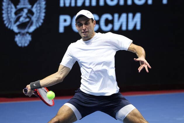 Saint Petersburg, Russia - 28 october 2021: Tennis. Aslan Karatsev plays during a match against John Millman at the St.Petersburg Open 2021 tennis tournament. Aslan Karatsev. MaksimxKonstantinov