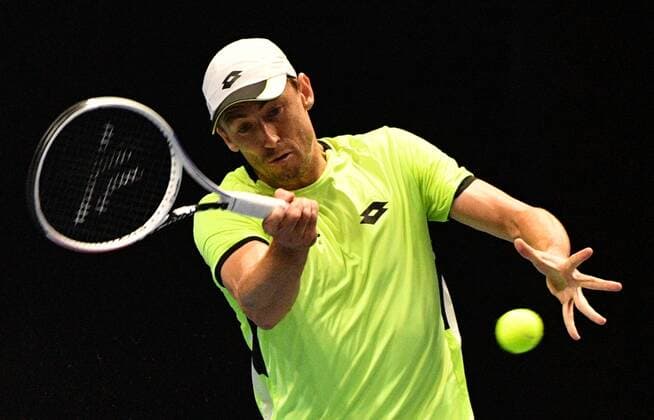 6683362 28.10.2021 Australia s John Millman returns the ball during the men s singles 2nd round match against Russia s Aslan Karatsev at the St. Petersburg Open international tennis tournament at Sibur Arena, in St. Petersburg, Japan. Alexander Galperin Sputnik Russia Tennis St Petersburg Open  c82da9ca6b1767d0