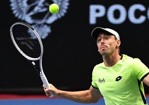 Sport Bilder des Tages 6683363 28.10.2021 Australia s John Millman returns the ball during the men s singles 2nd round match against Russia s Aslan Karatsev at the St. Petersburg Open international tennis tournament at Sibur Arena, in St. Petersburg, Japan. Alexander Galperin Sputnik Russia Tennis St Petersburg Open  21b762d080c874b6