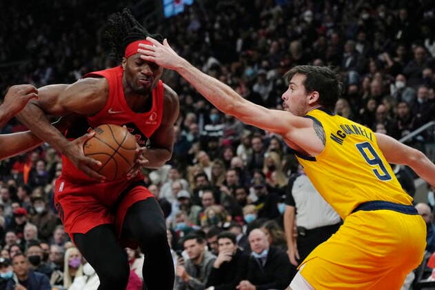October 27, 2021, TORONTO, ON, CANADA: Toronto Raptors forward Precious Achiuwa (5) is fouled by Indiana Pacers guard T.J. McConnell (9) during first half NBA, Basketball Herren, USA basketball action in Toronto on Wednesday, October 27, 2021. Canada News - October 27, 2021  - ZUMAc35_ 20211027_zaf_c35_087 Copyright: xNathanxDenettex