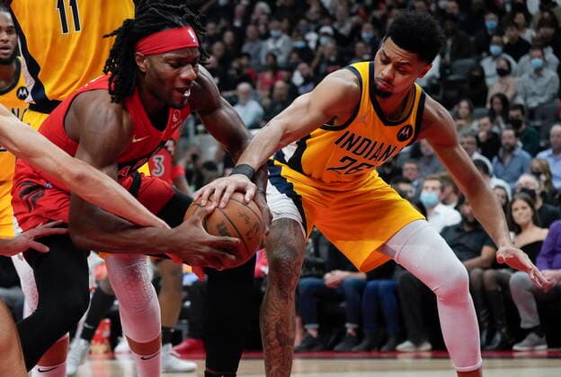 October 27, 2021, TORONTO, ON, CANADA: Toronto Raptors forward Precious Achiuwa (5) battles for the ball against Indiana Pacers guard Jeremy Lamb (26) during first half NBA, Basketball Herren, USA basketball action in Toronto on Wednesday, October 27, 2021. Canada News - October 27, 2021  - ZUMAc35_ 20211027_zaf_c35_098 Copyright: xNathanxDenettex