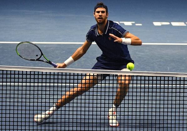6683599 28.10.2021 Russia s Karen Khachanov returns the ball during the men s singles 2nd round match against Croatia s Marin Cilic at the St. Petersburg Open international tennis tournament at Sibur Arena, in St. Petersburg, Russia. Alexander Galperin Sputnik Russia Tennis St Petersburg Open  821b8299b0cb8e81