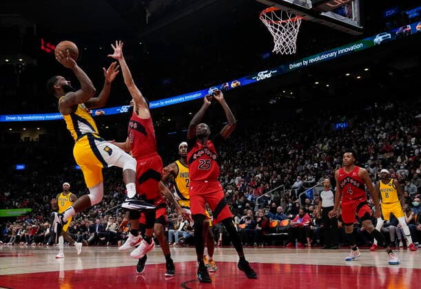 October 27, 2021, TORONTO, ON, CANADA: Indiana Pacers guard Brad Wanamaker (10) shoots the ball past Toronto Raptors guard Fred VanVleet (23) as Raptors forward Chris Boucher (25) looks on during second half NBA, Basketball Herren, USA basketball action in Toronto on Wednesday, October 27, 2021. Canada News - October 27, 2021  - ZUMAc35_ 20211027_zaf_c35_136 Copyright: xNathanxDenettex