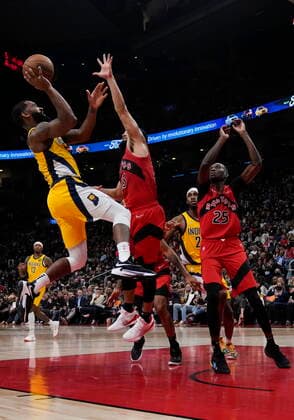 October 27, 2021, TORONTO, ON, CANADA: Indiana Pacers guard Brad Wanamaker (10) shoots the ball past Toronto Raptors guard Fred VanVleet (23) as Raptors forward Chris Boucher (25) looks on during second half NBA, Basketball Herren, USA basketball action in Toronto on Wednesday, October 27, 2021. Canada News - October 27, 2021  - ZUMAc35_ 20211027_zaf_c35_137 Copyright: xNathanxDenettex