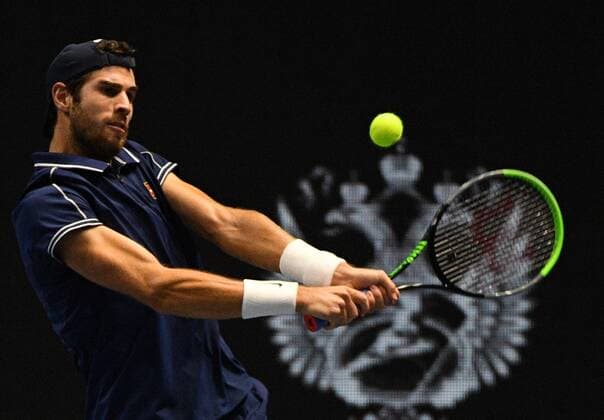 6683675 28.10.2021 Russia s Karen Khachanov returns the ball during the men s singles 2nd round match against Croatia s Marin Cilic at the St. Petersburg Open international tennis tournament at Sibur Arena, in St. Petersburg, Russia. Alexander Galperin Sputnik Russia Tennis St Petersburg Open  798ac1516a0a9be7