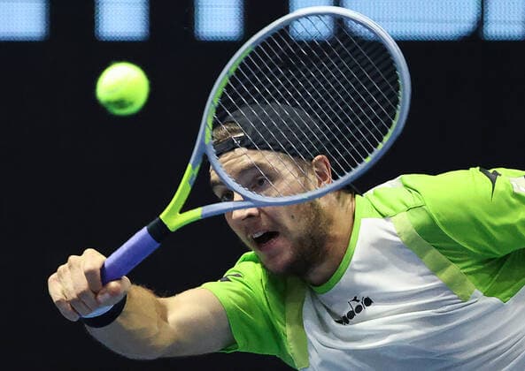 ST PETERSBURG, RUSSIA - OCTOBER 29, 2021: Canada s Denis Shapovalov returns the ball in his men s singles quarterfinal match against Germany s Jan-Lennard Struff at the St Petersburg Open 2021 international tennis tournament at Sibur Arena. Peter Kovalev TASS  TS11636E