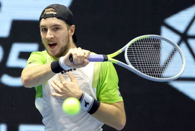 ST PETERSBURG, RUSSIA - OCTOBER 29, 2021: Canada s Denis Shapovalov returns the ball in his men s singles quarterfinal match against Germany s Jan-Lennard Struff at the St Petersburg Open 2021 international tennis tournament at Sibur Arena. Peter Kovalev TASS  TS11636F