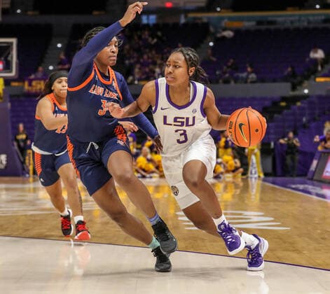 October 30, 2021: LSU s Khayla Pointer (3) drives past Langston s Asheika Alexander (3) during NCAA, College League, USA Women s Basketball action between the Langston Lions and the LSU Tigers at the Pete Maravich Assembly Center in Baton Rouge, LA. CSM Baton Rouge USA - ZUMAc04_ 20211030_zaf_c04_443 Copyright: xJonathanxMailhesx