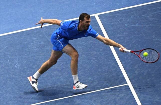 6685992 31.10.2021 Britian s Jamie Murray returns a shot during the men s doubles final match against Andrey Golubev (Kazakhstan) and Hugo Nys (Monaco) at the St. Petersburg Open international tennis tournament in St. Petersburg, Russia. Alexander Galperin Sputnik Russia Tennis St Petersburg Open  240aab2fb504475a