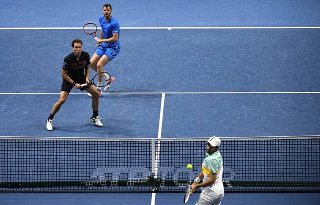 6685994 31.10.2021 Britian s Jamie Murray and Brazil s Bruno Soares compete against Kazakhstan s Andrey Golubev and Monaco s Hugo Nys during the men s doubles final match at the St. Petersburg Open international tennis tournament in St. Petersburg, Russia. Alexander Galperin Sputnik Russia Tennis St Petersburg Open  40ef835a5d044e4b