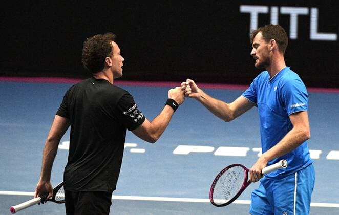 6686003 31.10.2021 Britian s Jamie Murray and Brazil s Bruno Soares knock with knuckles during the men s doubles final match against Kazakhstan s Andrey Golubev and Monaco s Hugo Nys at the St. Petersburg Open international tennis tournament in St. Petersburg, Russia. Alexander Galperin Sputnik Russia Tennis St Petersburg Open  7282b5f5017c9b97