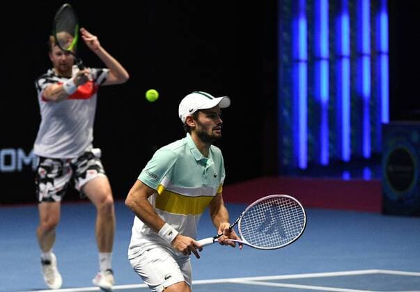 6686010 31.10.2021 Kazakhstan s Andrey Golubev and Monaco s Hugo Nys compete in the men s doubles final match against Britian s Jamie Murray and Brazil s Bruno Soares at the St. Petersburg Open international tennis tournament in St. Petersburg, Russia. Alexander Galperin Sputnik Russia Tennis St Petersburg Open  e329f9c47dd84c76