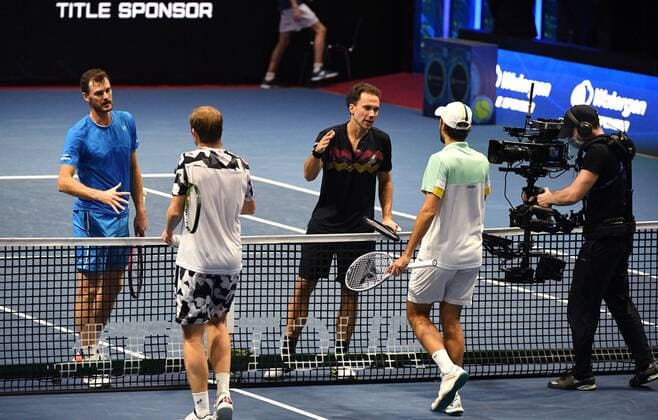 6686030 31.10.2021 Britian s Jamie Murray, Brazil s Bruno Soares, from left in the background, Kazakhstan s Andrey Golubev and Monaco s Hugo Nys shake hands after the men s doubles final match at the St. Petersburg Open international tennis tournament in St. Petersburg, Russia. Alexander Galperin Sputnik Russia Tennis St Petersburg Open  cde70457271641f2